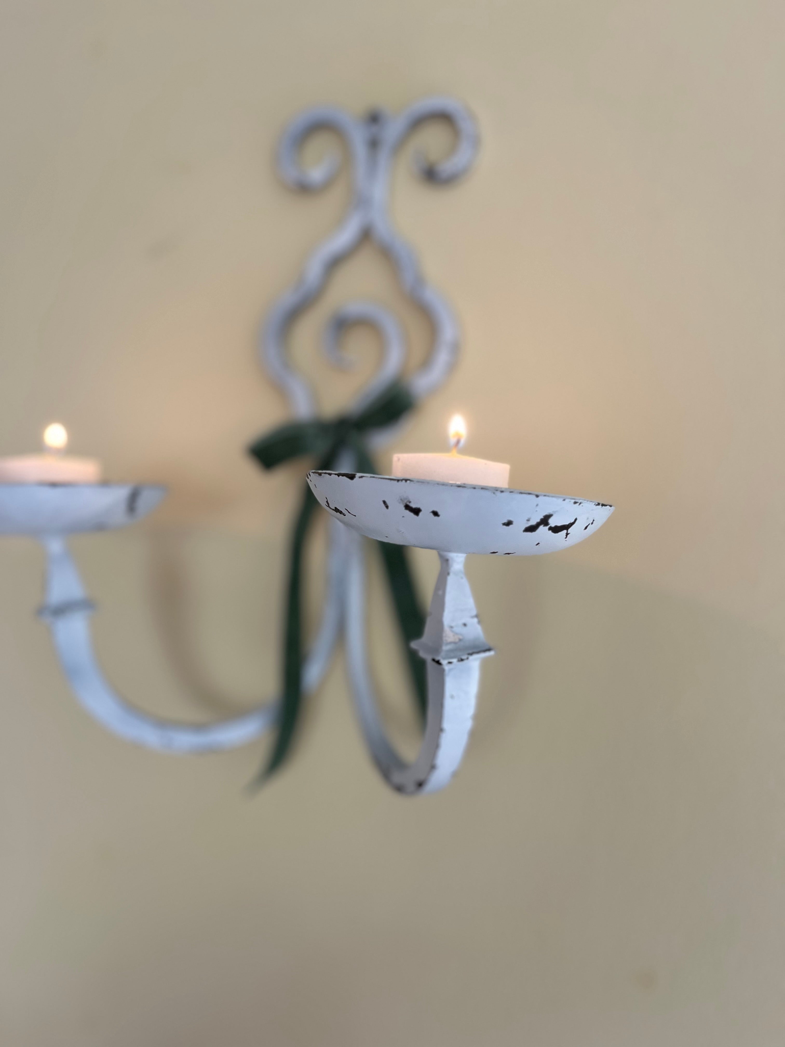 White metal sconces