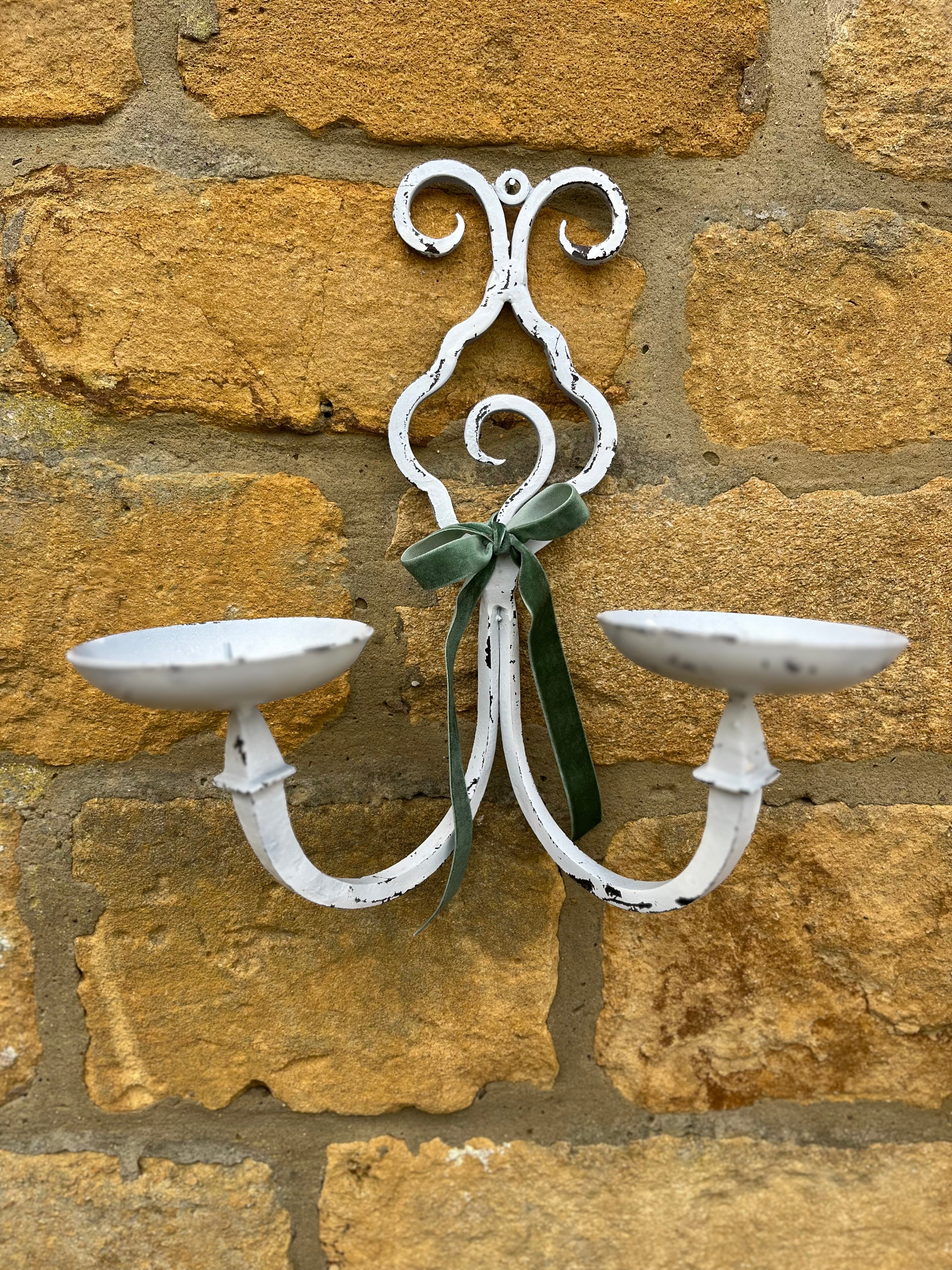 White metal sconces