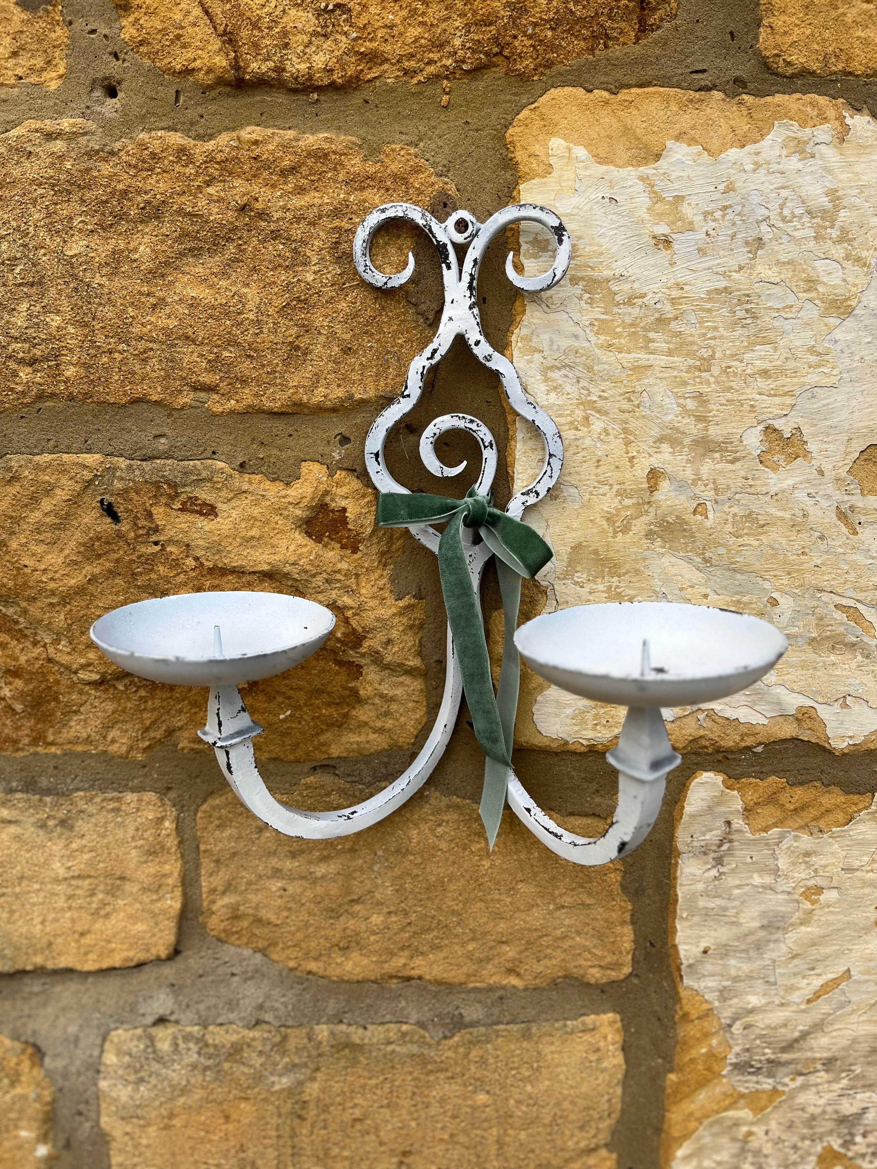 White metal sconces