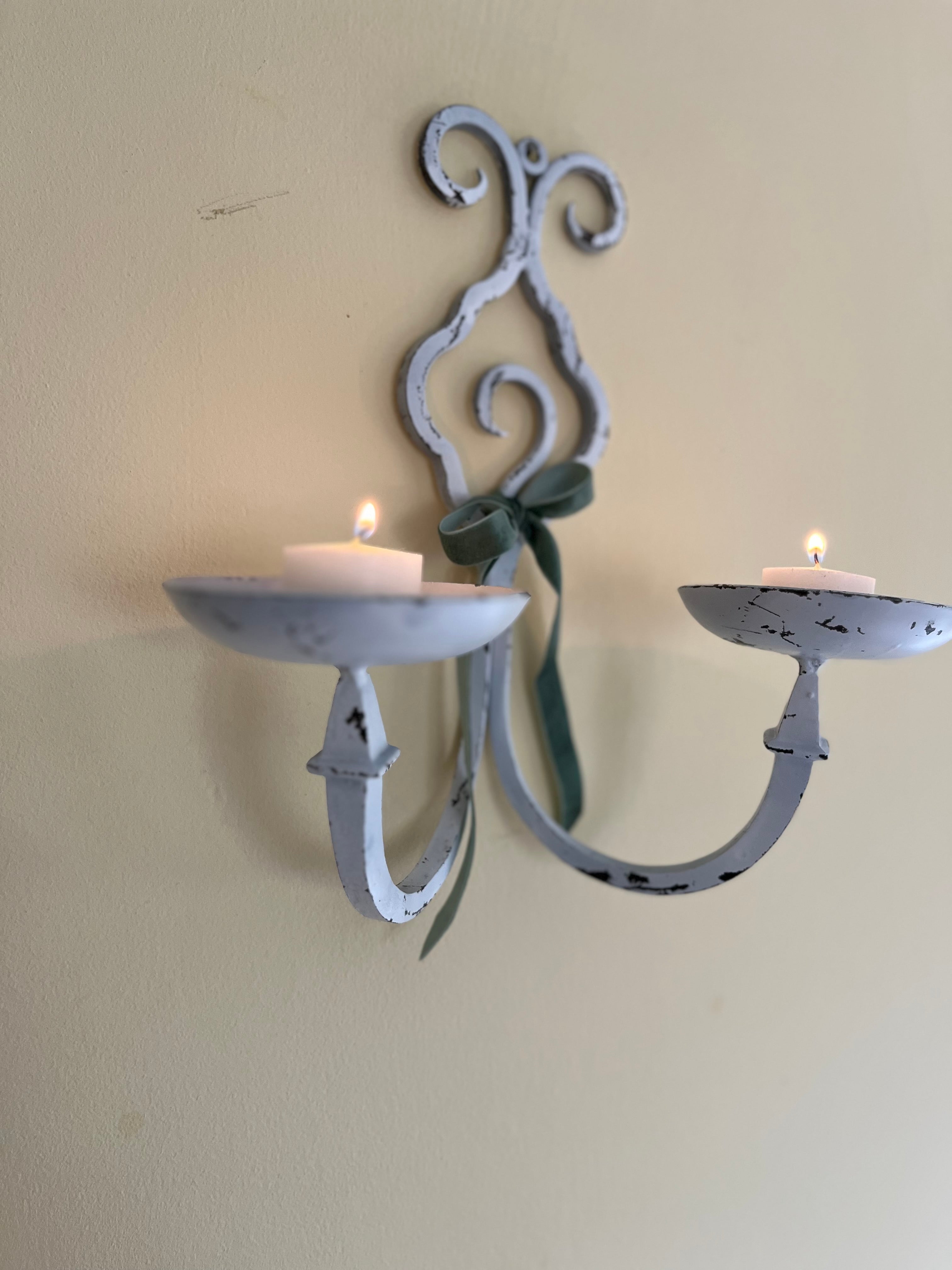 White metal sconces