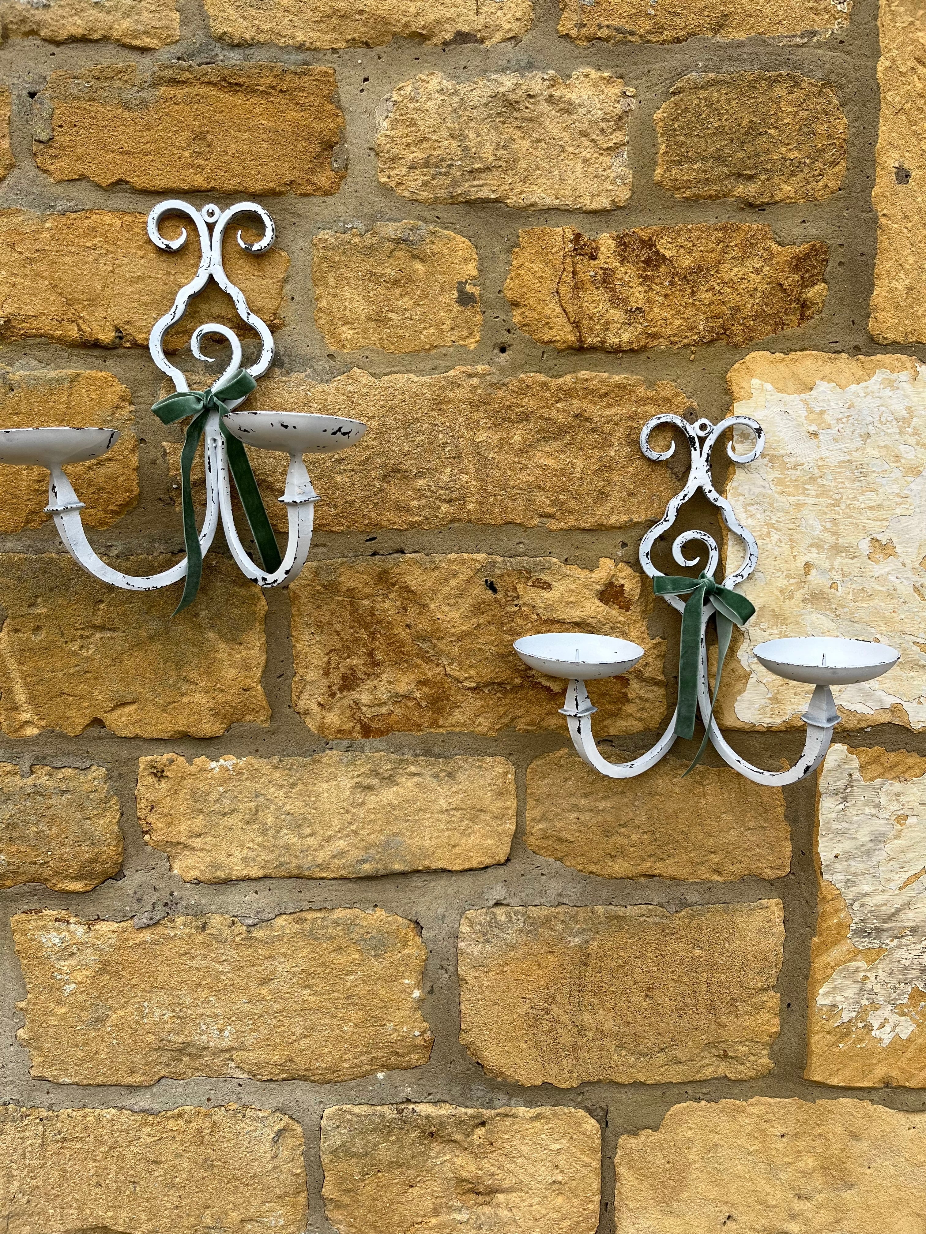 White metal sconces